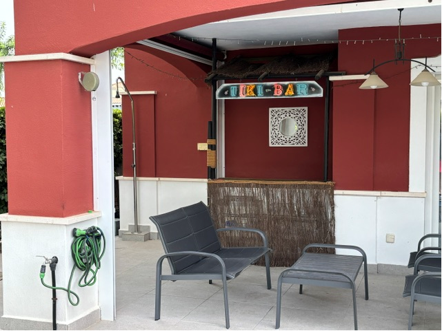 Covered terrace and tiki bar