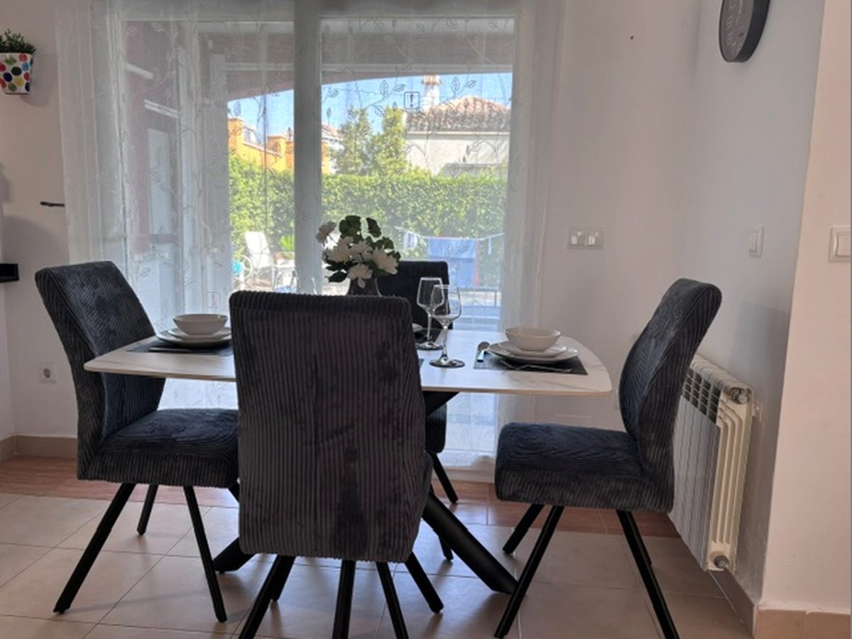 Dining table set for four