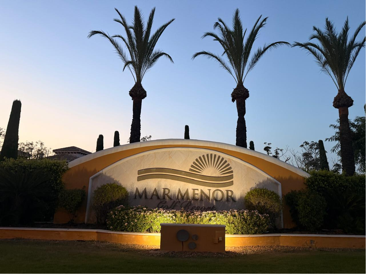 Mar Menor Golf Resort entrance sign at dusk
